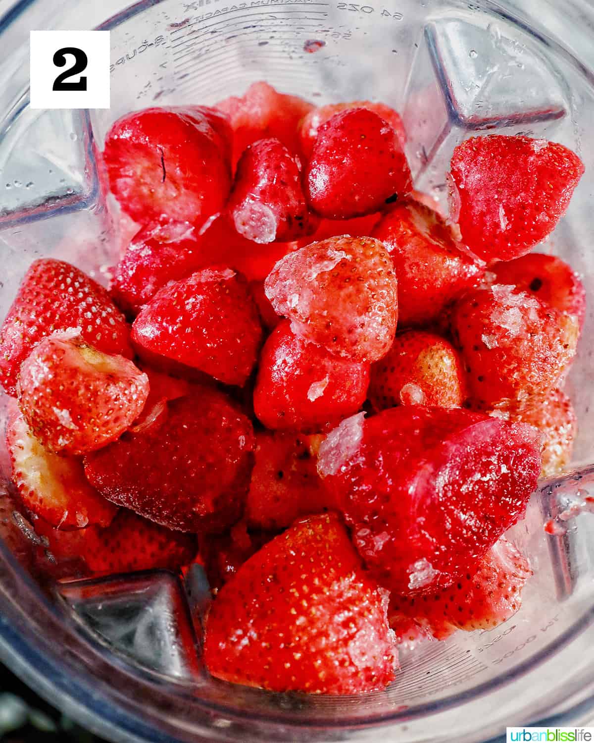 lots of strawberries in a blender.