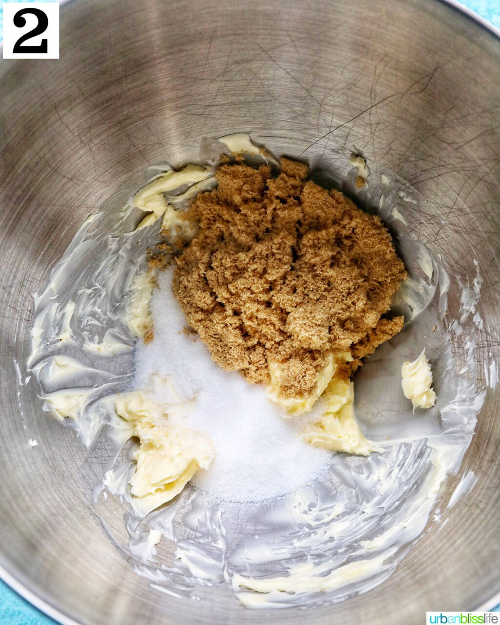 brown sugar and butter in a stainless steel stand mixer bowl.