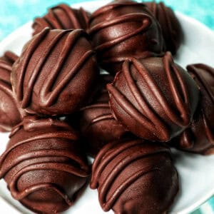 stack of chocolate honey bourbon truffles.