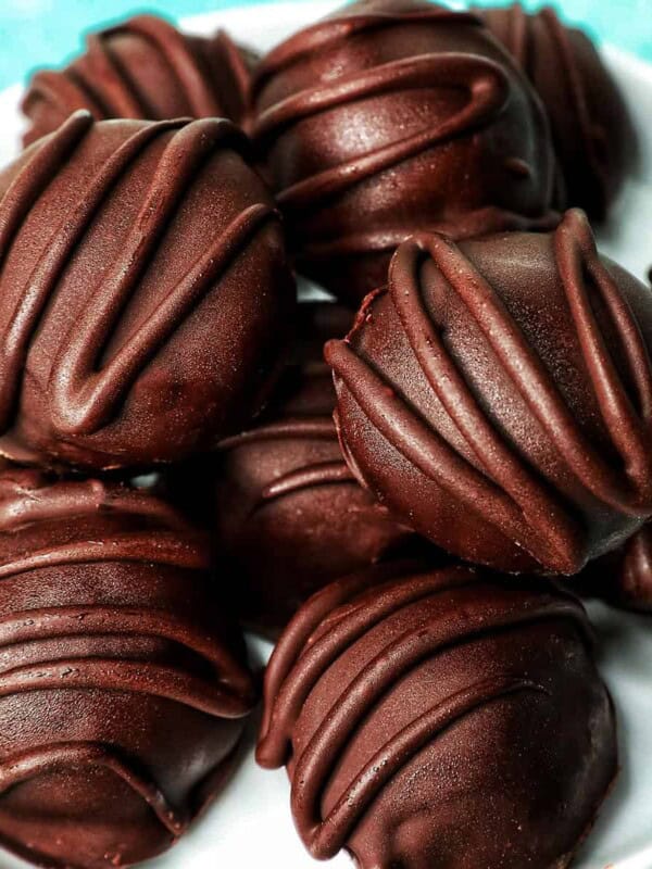 stack of chocolate honey bourbon truffles.