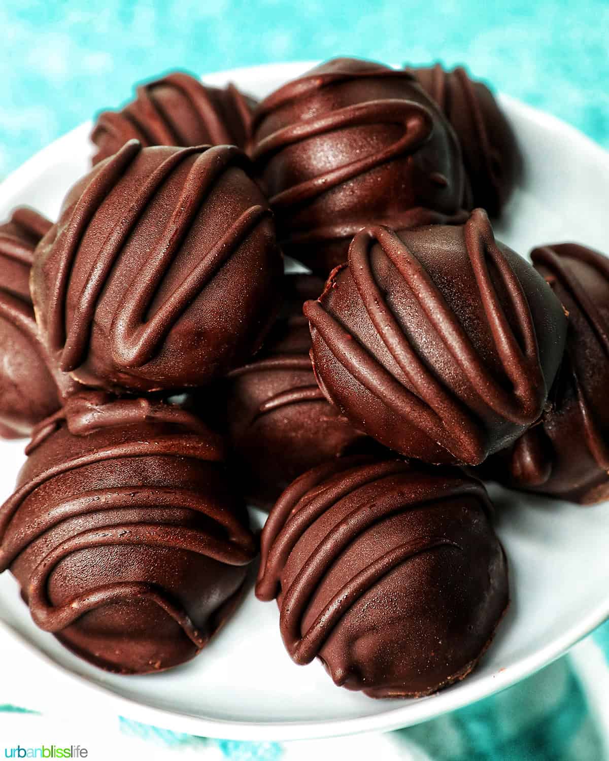 stack of chocolate honey bourbon truffles.