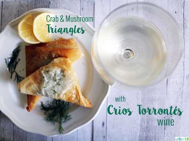 Crab Puffs and Mushroom Puff Pastry Triangle Appetizer with white wine