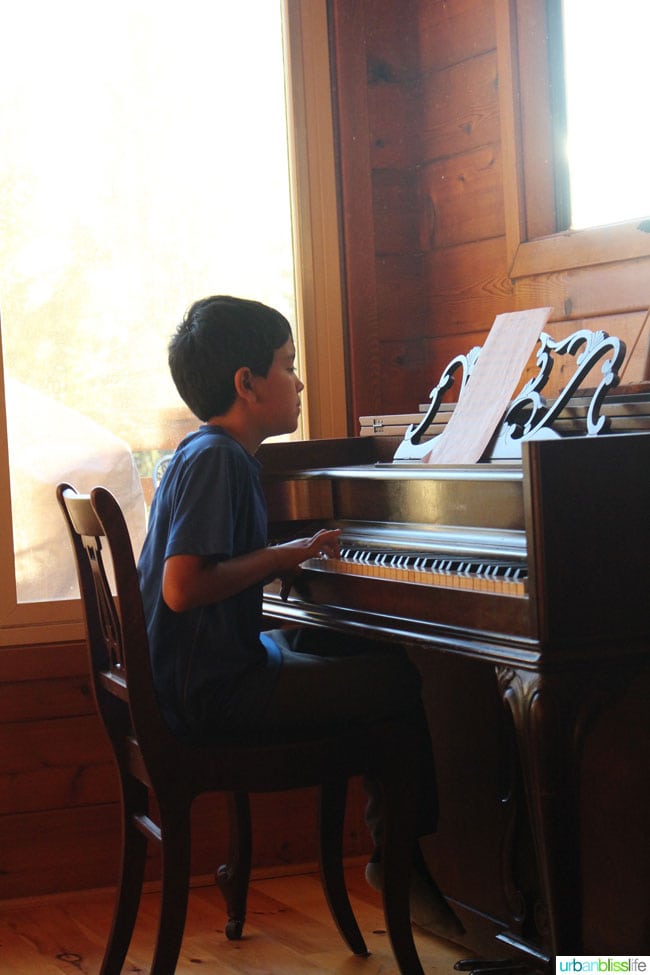 kid playing piano