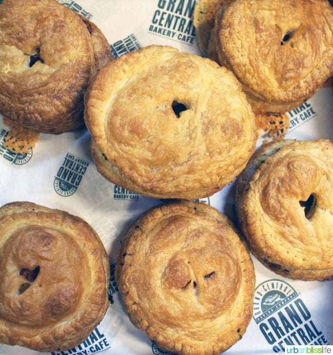 several Butternut Squash Mushroom Sage Puff Pastries in a bakery box.