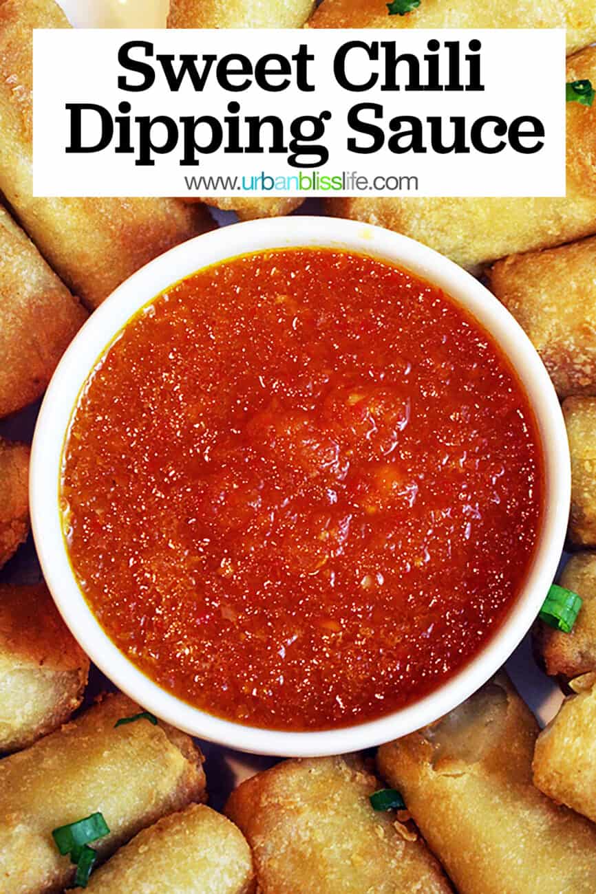 sweet chili dipping sauce in a bowl surrounded by egg rolls with text that reads Sweet Chili Dipping Sauce.