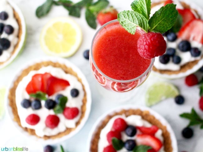 Raspberry Bellini with mini fruit tarts