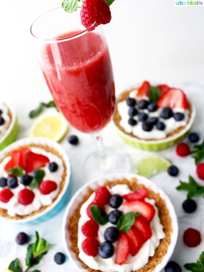 Raspberry Bellini with mini fruit tarts