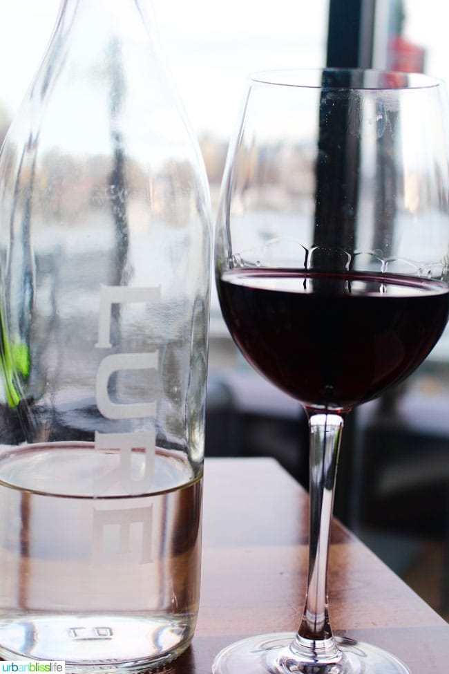 glass of red wine at Lure Restaurant in Victoria British Columbia, Canada.