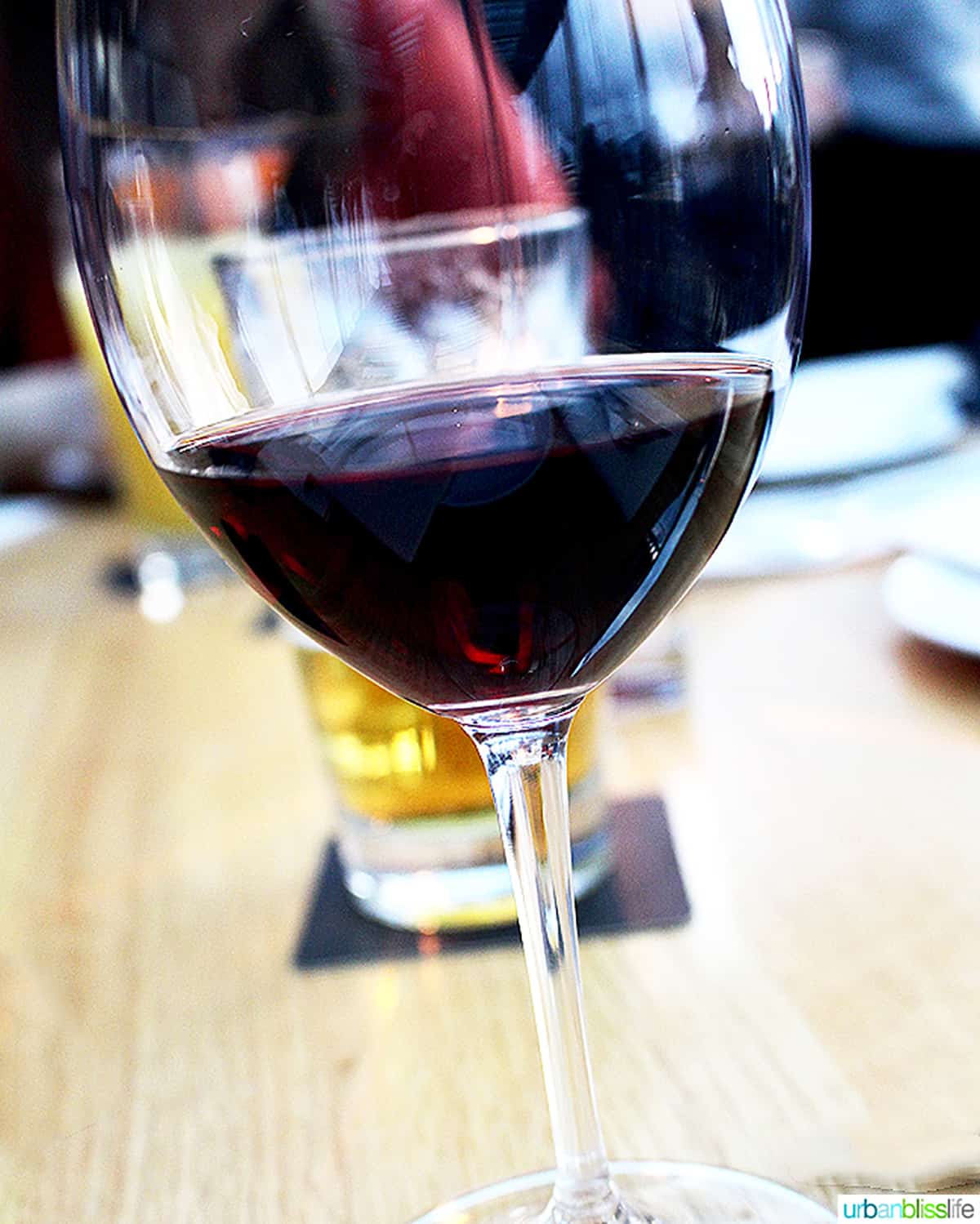 glass of red wine at Cactus Club Cafe Coal Harbour Vancouver BC.