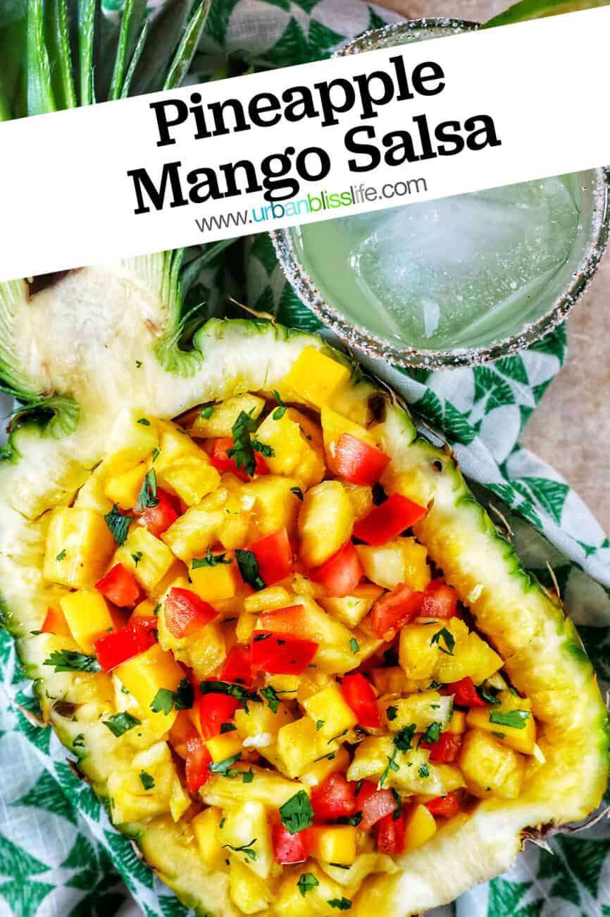 hollowed out pineapple filled with pineapple mango salsa with a glass of margarita and title text overlay.