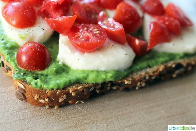 Pesto Caprese Tartines are the perfect open-faced sandwiches to serve for lunch or dinner, or as party appetizers! Recipe on UrbanBlissLife.com