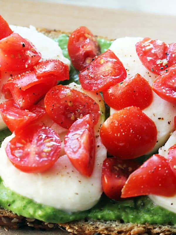 caprese tartines with avocado pesto spread