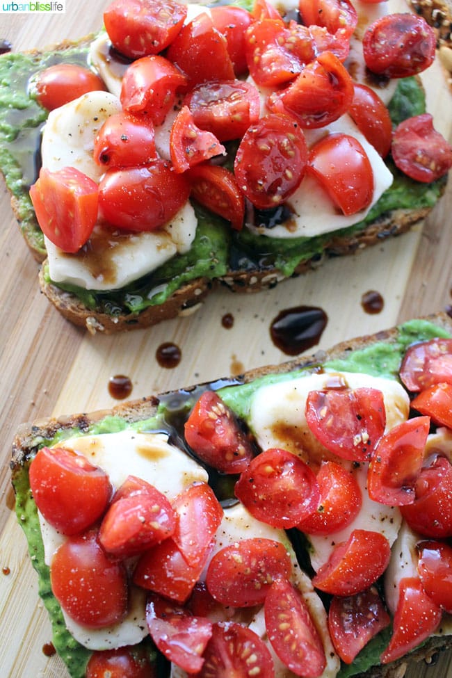 Pesto Caprese Tartines are the perfect open-faced sandwiches to serve for lunch or dinner, or as party appetizers! Recipe on UrbanBlissLife.com