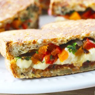 Chorizo Queso Peppers Panini are hearty, delicious sandwiches perfect for lunch, dinner, or to make to feed a crowd for tailgating, holiday parties, and more! Recipe on UrbanBlissLife.com