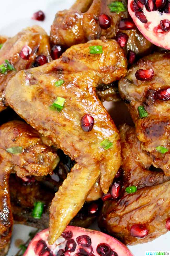 Cranberry Pomegranate Sticky Chicken Wings recipe on http://UrbanBlissLife.com