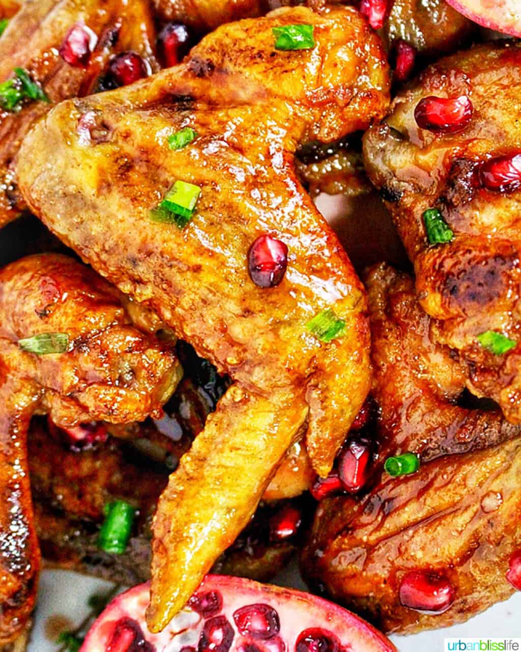 closeup of cranberry pomegranate sticky wings.