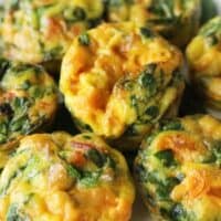 Cheesy Spinach Mini Frittatas are easy, tasty, make-ahead breakfast and brunch! Recipe on UrbanBlissLife.com