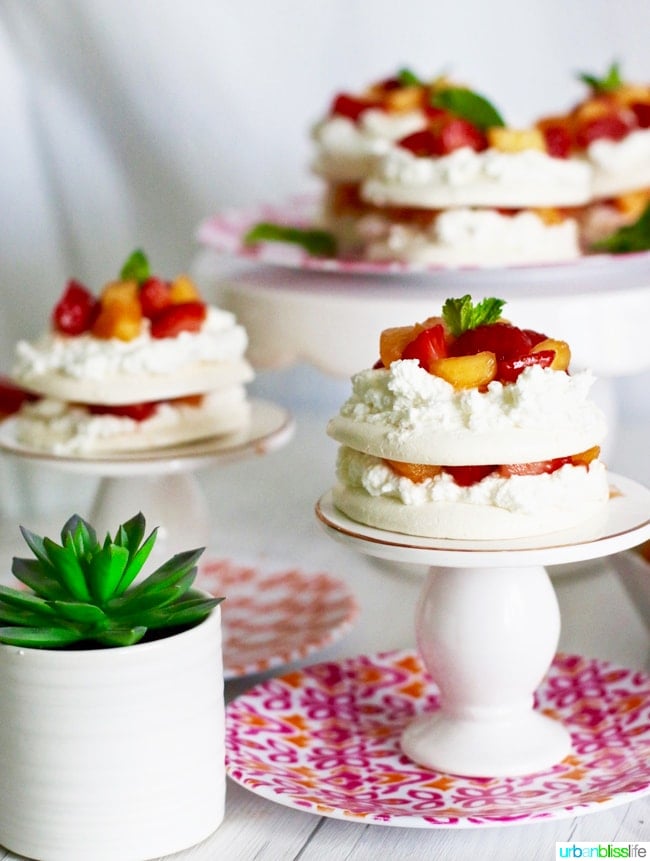 Mini Pavlova Cakes with Strawberries, Peaches, and Cream recipe on UrbanBlissLife.com