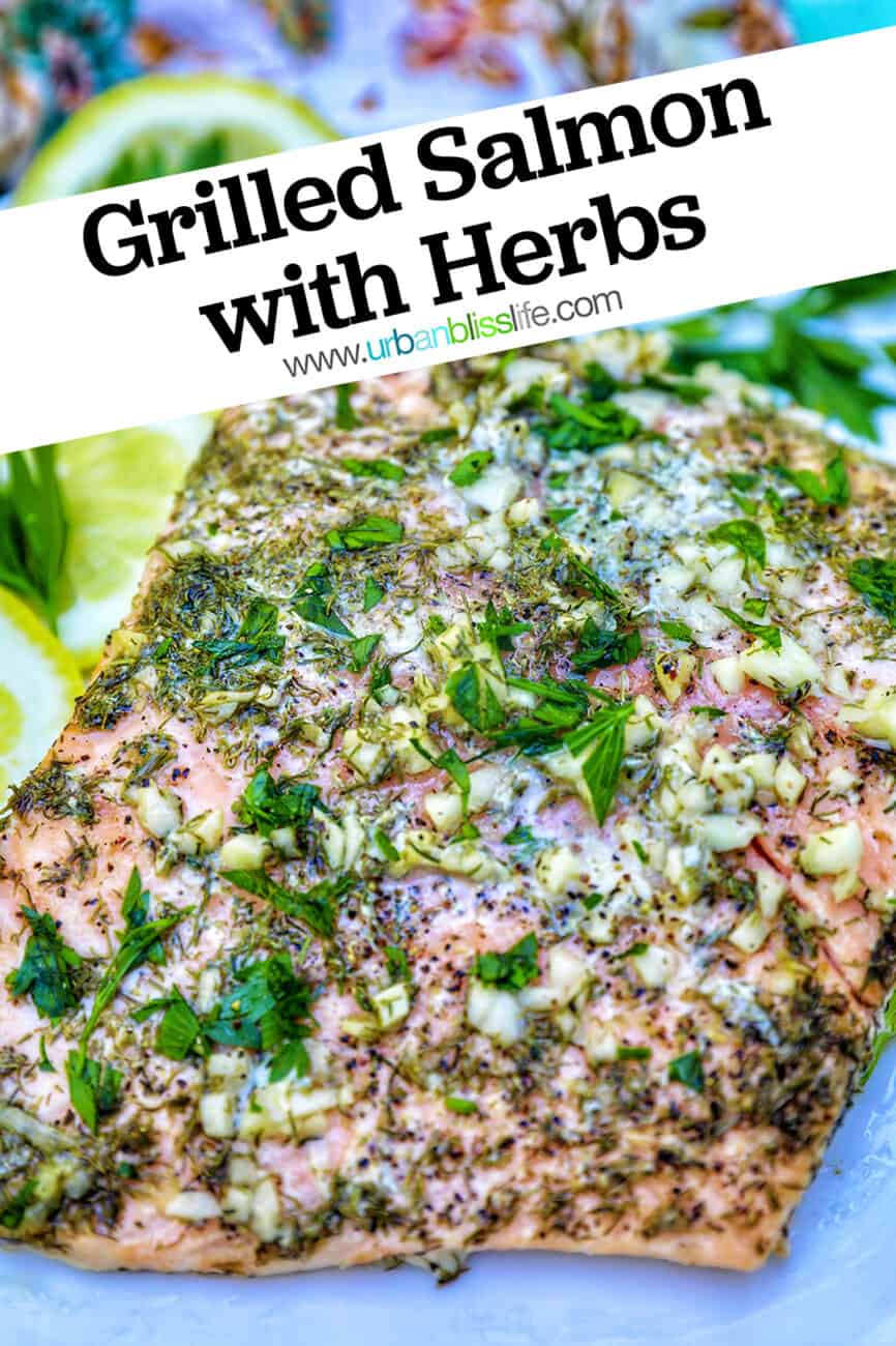 grilled salmon with lemon slices, garlic, and herbs on a checkered tablecloth with title text overlay.