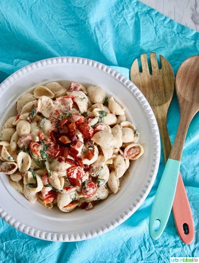 Yummy, rich, creamy BLT Pasta Salad combines two fave comfort foods in one! Recipe on UrbanBlissLife.com.