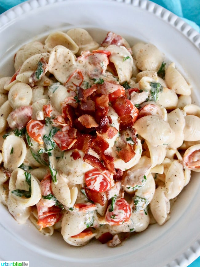 Yummy, rich, creamy BLT Pasta Salad combines two fave comfort foods in one! Recipe on UrbanBlissLife.com.