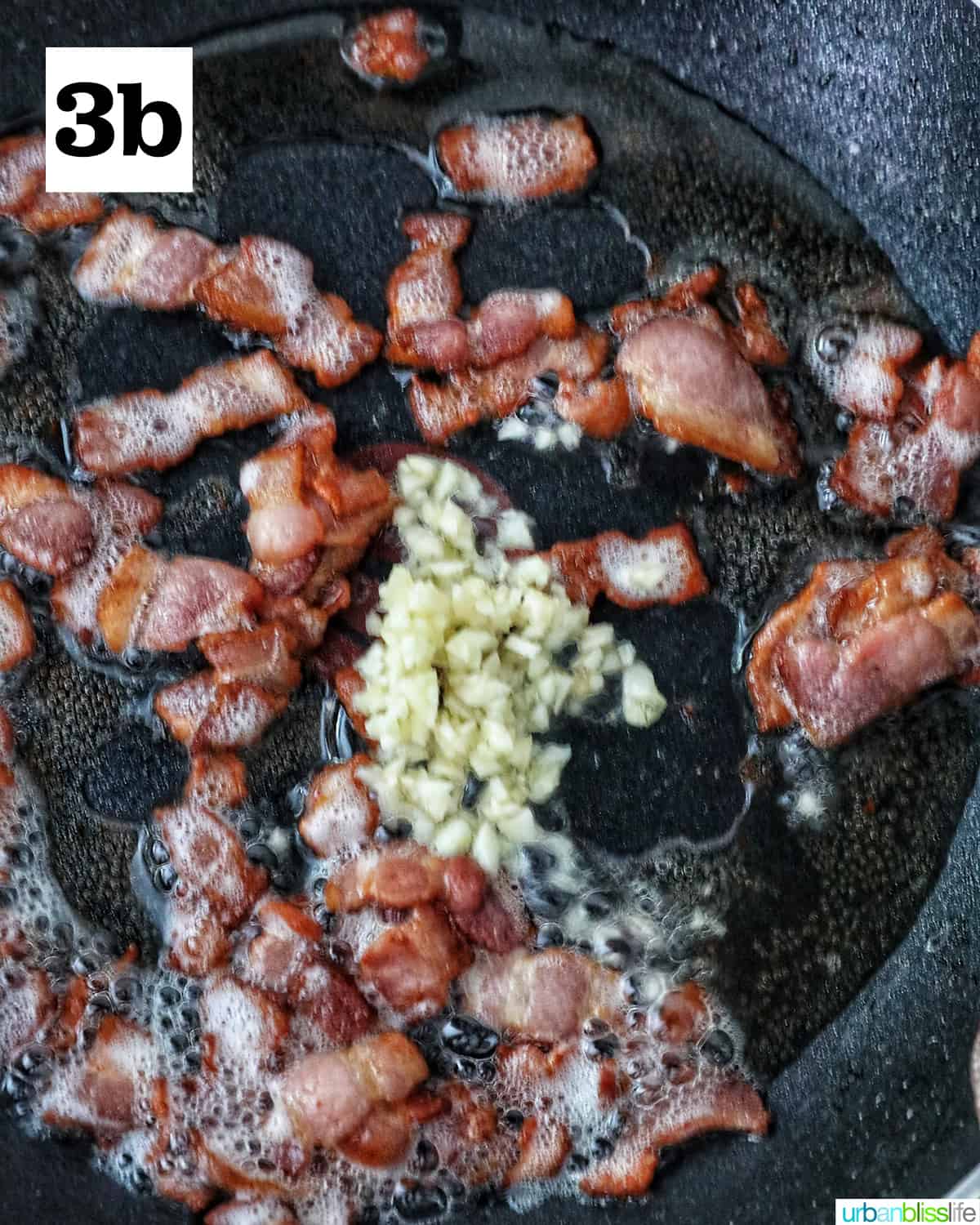 sliced bacon and minced garlic frying together in a nonstick skillet.