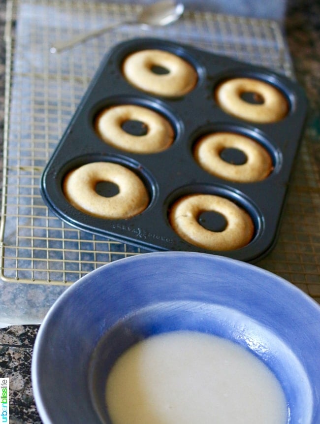 donuts and ingredients in pan and bowl