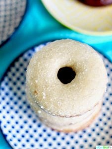 Baked Cinnamon Sugar Donuts with Icing Glaze stacked. Recipe on UrbanBlissLife.com