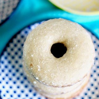 Baked Cinnamon Sugar Donuts with Icing Glaze stacked. Recipe on UrbanBlissLife.com