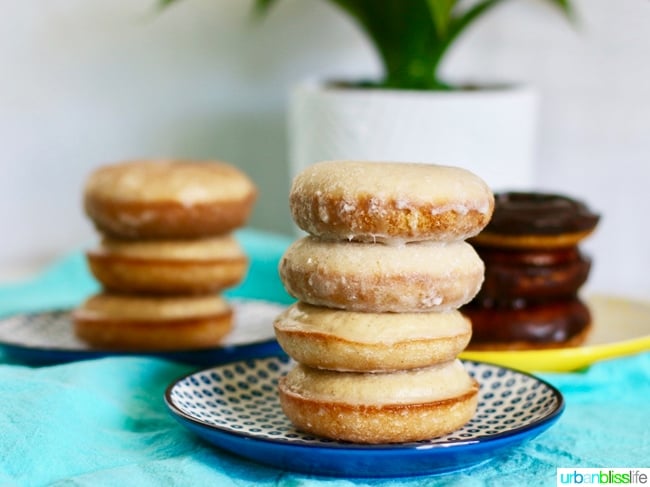 Baked Cinnamon Sugar Donuts with Three Glazes stacked. Recipe on UrbanBlissLife.com