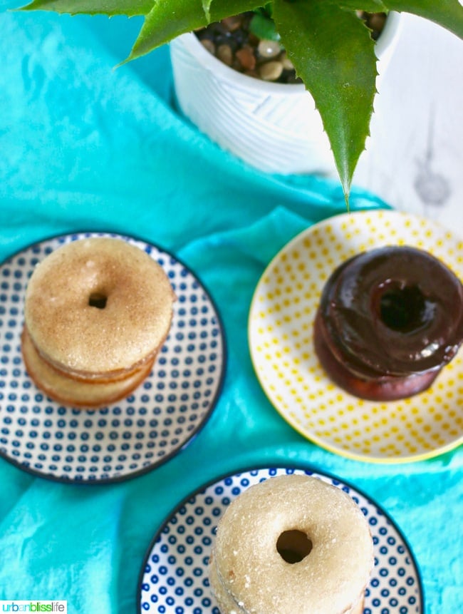 Baked Cinnamon Sugar Donuts with Three Glazes stacked. Recipe on UrbanBlissLife.com