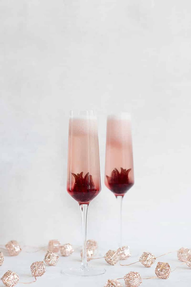 Ombre Prosecco Hibiscus 20 Festive Winter Party Cocktails on UrbanBlissLife.com