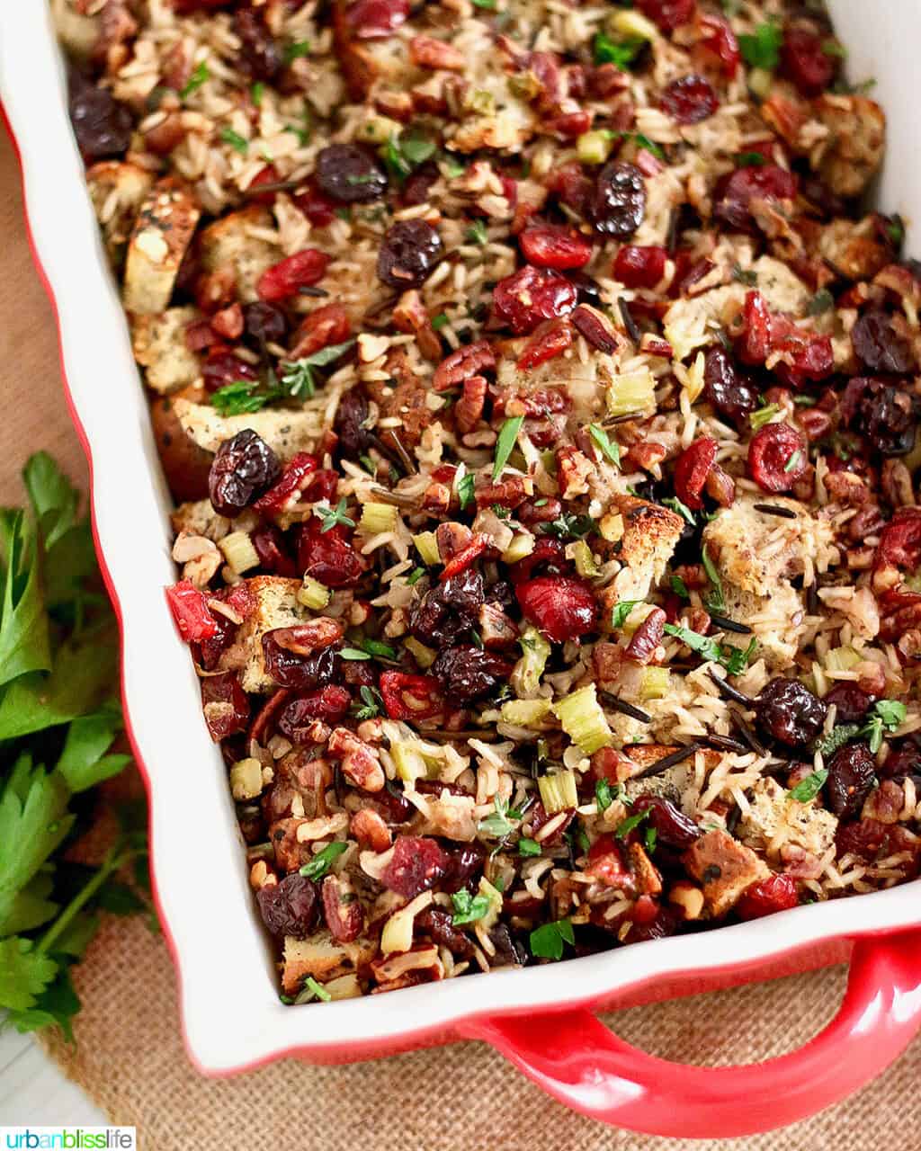 cranberry stuffing with wild rice and cherries in a casserole dish.