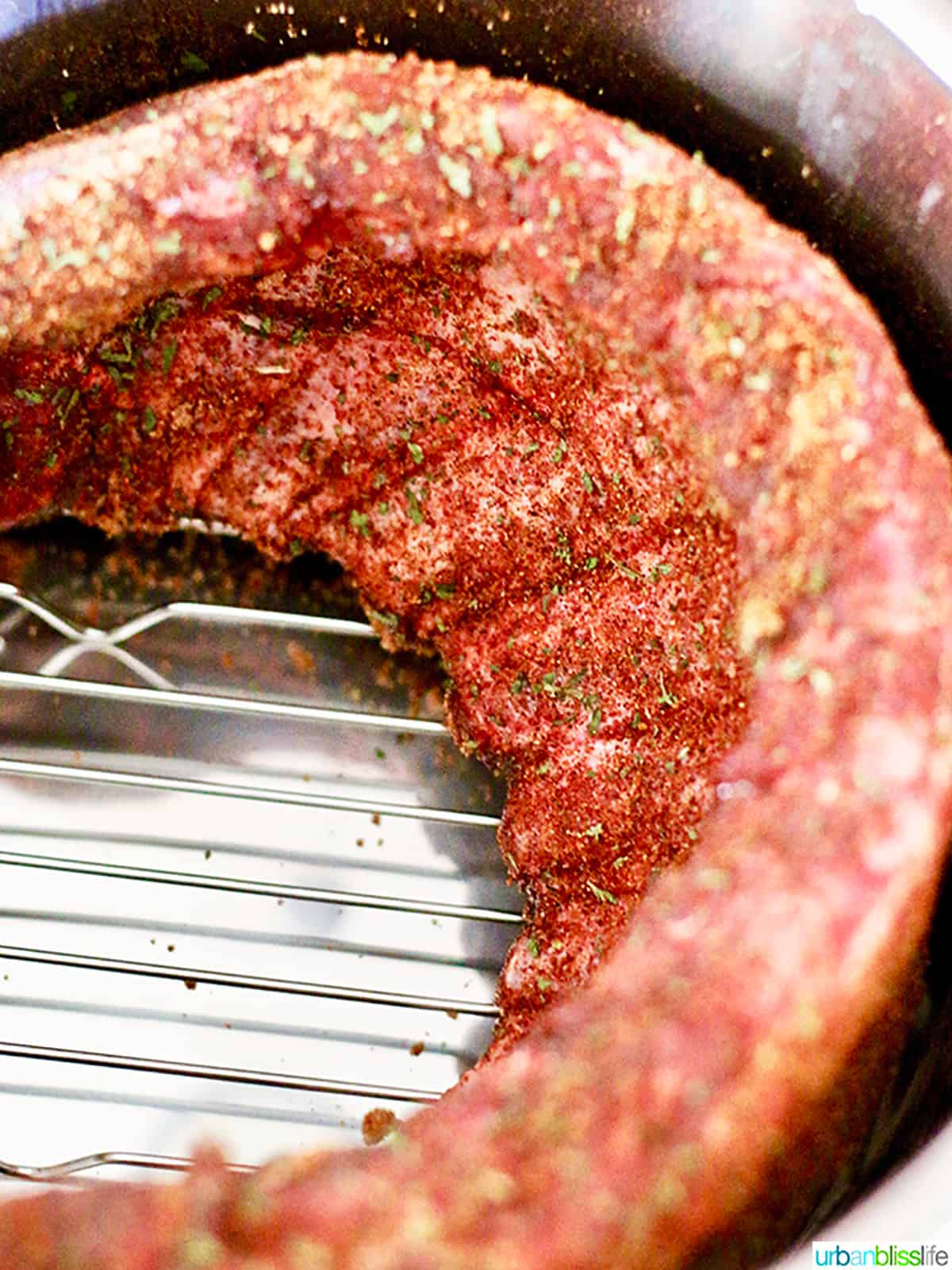seasoned baby back pork ribs inside an Instant Pot.
