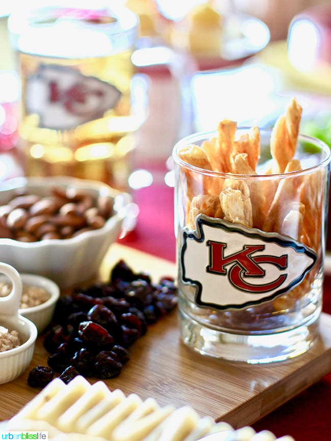 KC Chiefs glass with party food - Game Day Food and Drink Tips