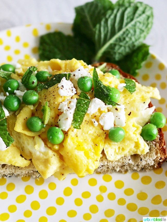 Scramble Eggs on Toast with peas and feta