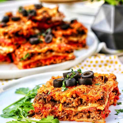 Mexican lasagna slice with more slices in the background
