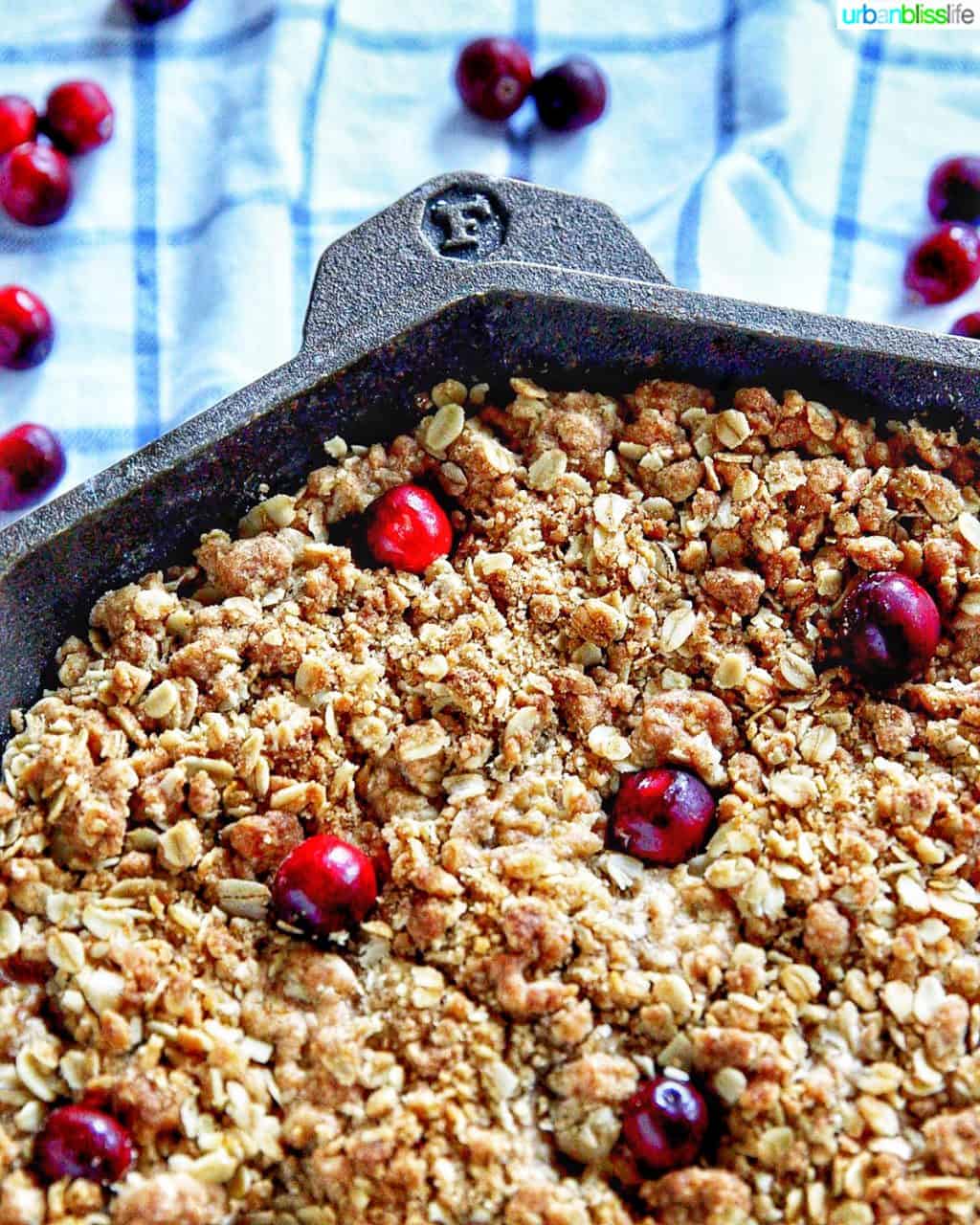 closeup corner of pan with apple cranberry crisp