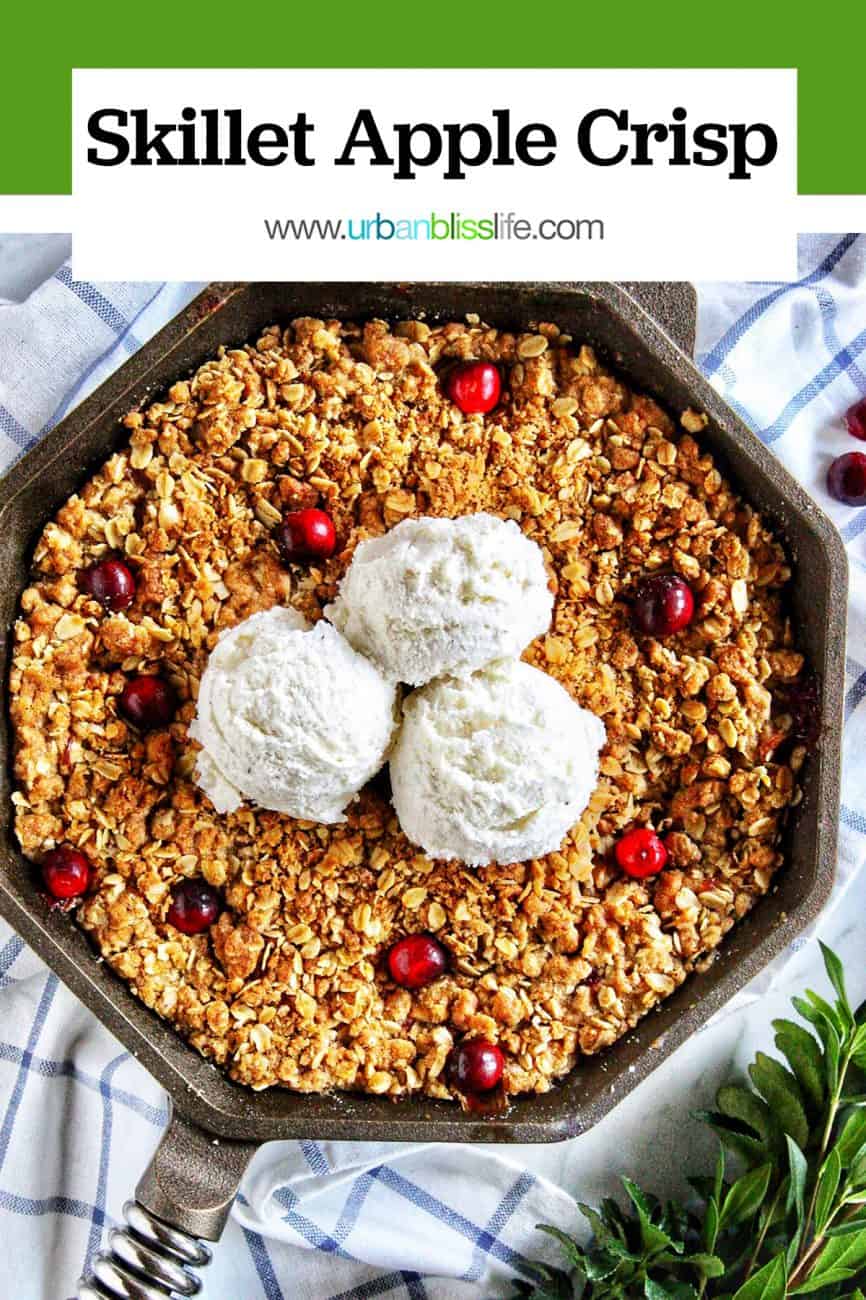 skillet apple cranberry crisp with three scoops of vanilla ice cream and green border title text overlay