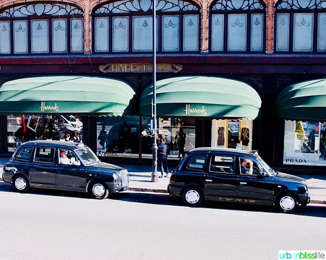 Harrod's London department store with taxis