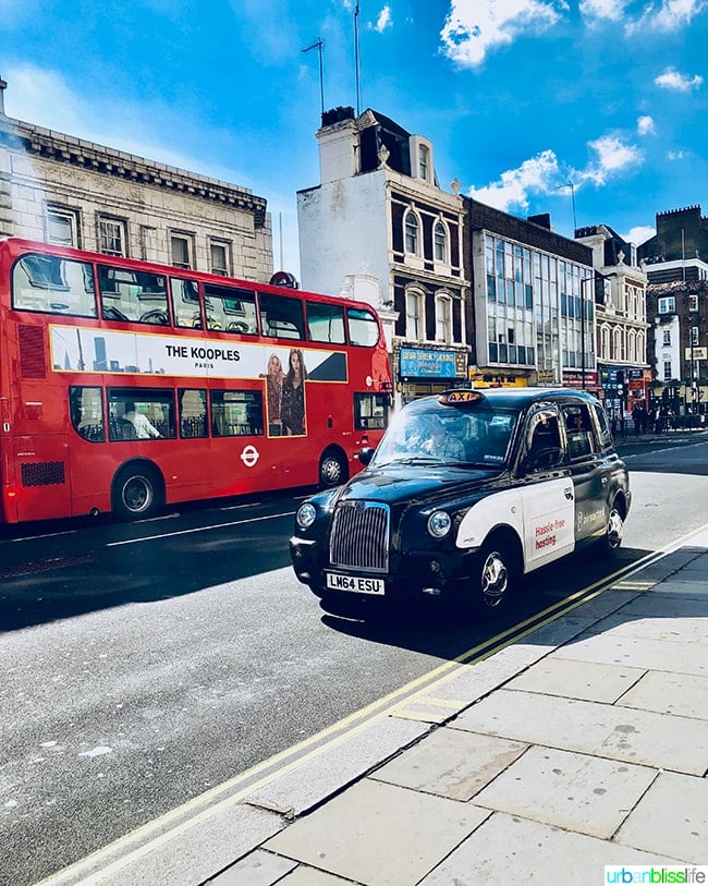 red double decker bus and black cab in London