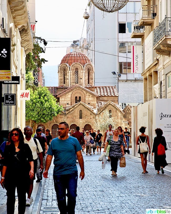 Athens street scene with Church of Panagia Kapnikarea in background