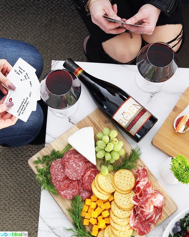 red wine, charcuterie board, game night with girlfriends