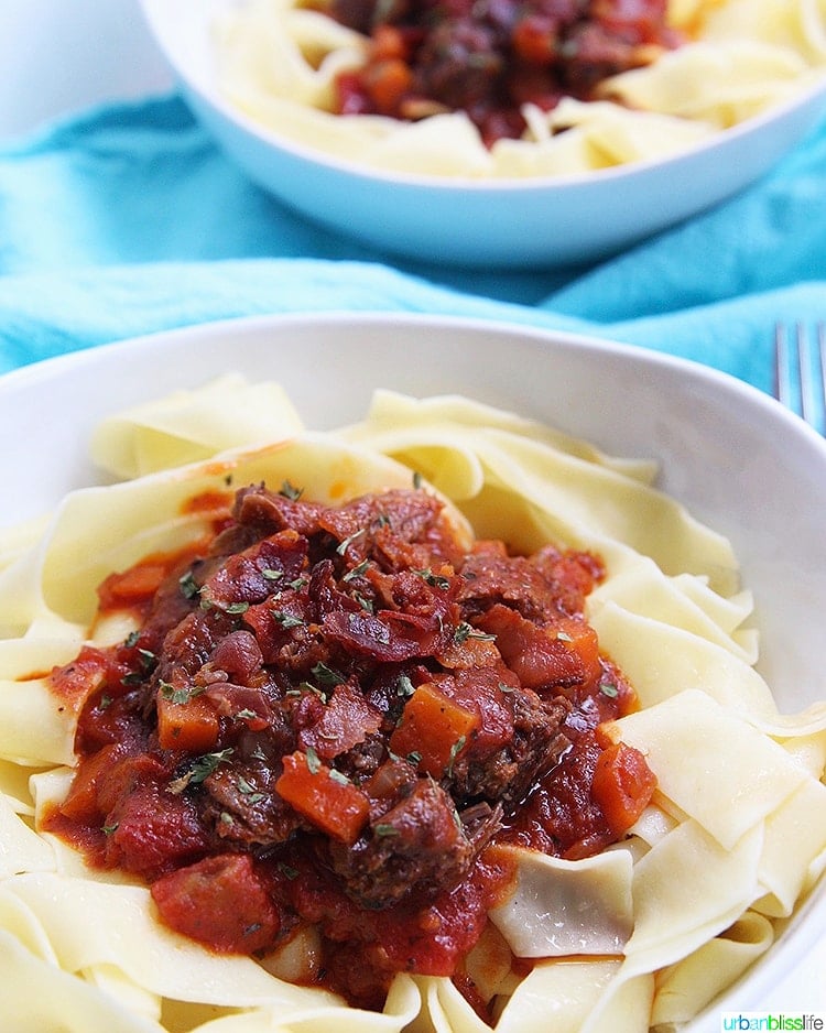 big bowls of Instant Pot Short Ribs Ragu over pasta