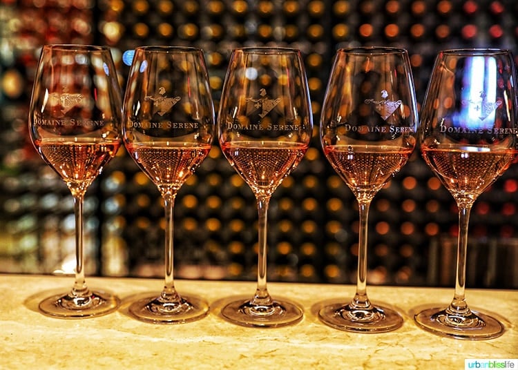 row of rose wine glasses at Domaine Serene