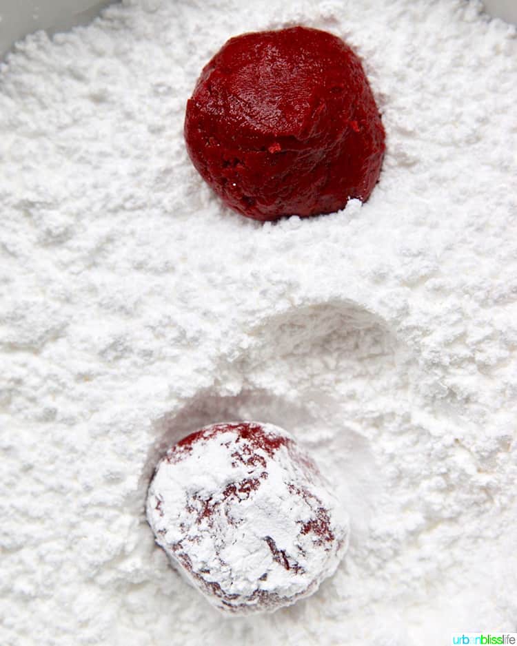 red velvet cookie dough rolled in powdered sugar