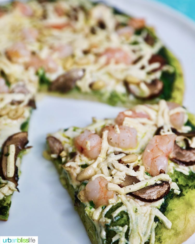 slice of shrimp pesto pizza