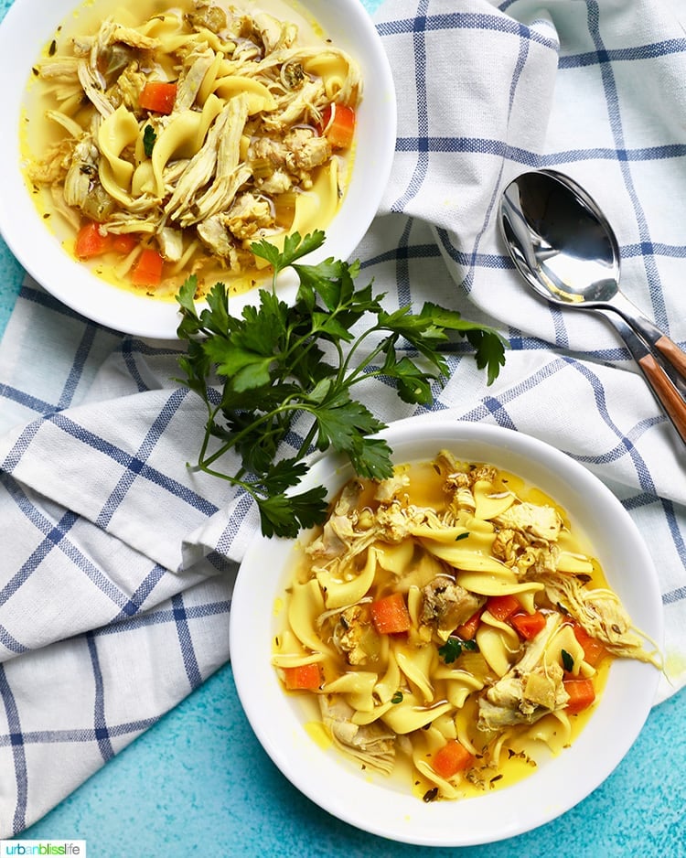 two bowls of immune boosting chicken noodle soup made in an instant pot