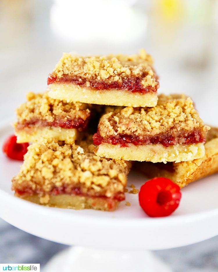 Raspberry Crumble Bars stacked onto a pedestal