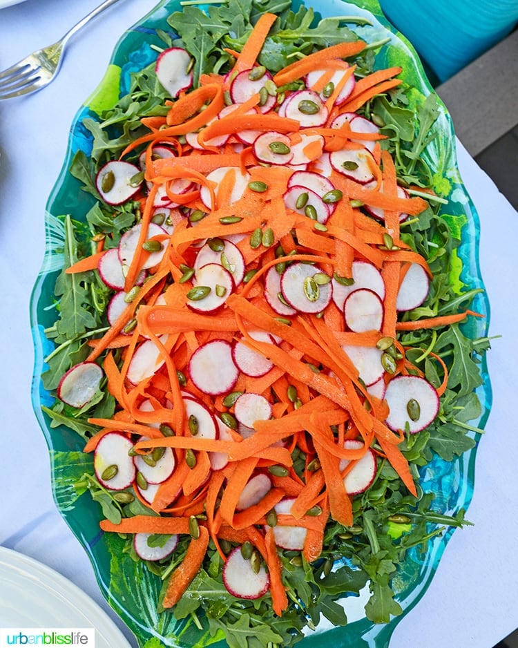 radish carrot salad on full serving plate